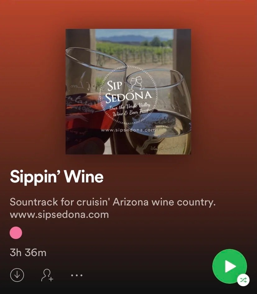 Spotify album 'Sippin' Wine' cover with wine glasses and vineyard backdrop.